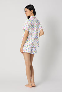 A lady wearing Cottage Parlor Short Sleeve Classic Shorty Stretch Jersey Pj Set back view