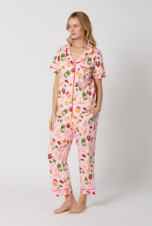 A lady wearing Pink Short Sleeve Classic Stretch Jersey Cropped Pj Set side view
