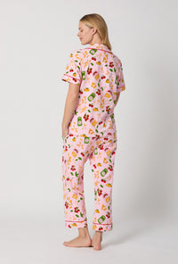 A lady wearing Pink Short Sleeve Classic Stretch Jersey Cropped Pj Set back view