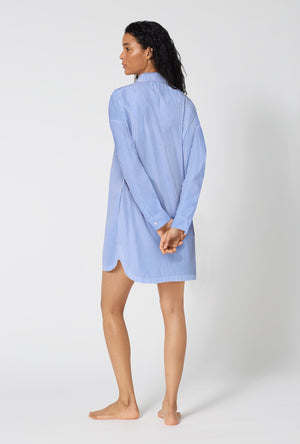 A Lady Wearing French Stripe High Low Woven Supersoft Cotton Poplin Boyfriend Shirt in a full back view pose