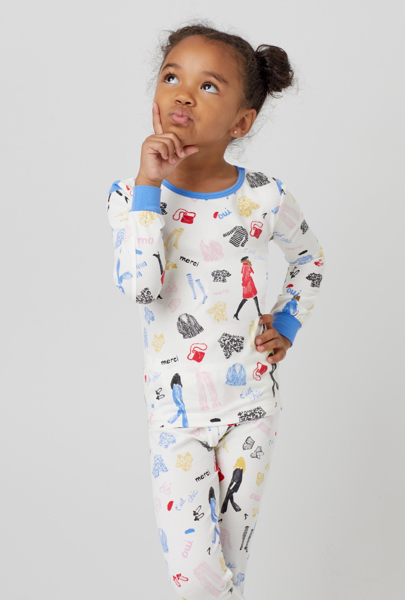 A  girl wearing  white Long Sleeve Stretch Jersey Kids PJ Set with Cest Chic  print