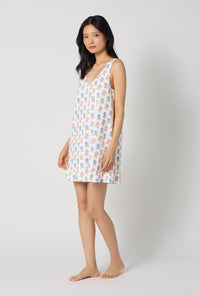 A lady wearing Cottage Parlor Ruffle Stretch Jersey Chemise looking side