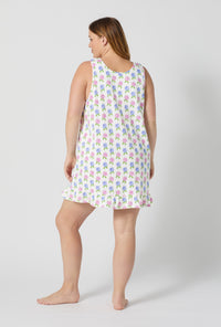 A lady wearing plus size Cottage Parlor Ruffle Stretch Jersey Chemise back view