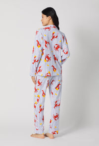 A lady wearing Coastal Feast Long Sleeve Classic Stretch Jersey Pj Set back view