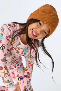 A girl wearing Newport Chic Boxers Long Sleeve Stretch Jersey Kids PJ Set