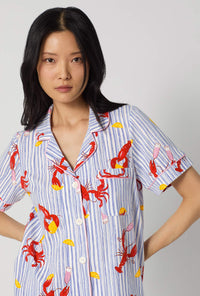 A lady wearing Coastal Feast Short Sleeve Classic Stretch Jersey Cropped Pj Set closer look