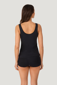 A lady wearing Black Stretch Jersey Tank back view