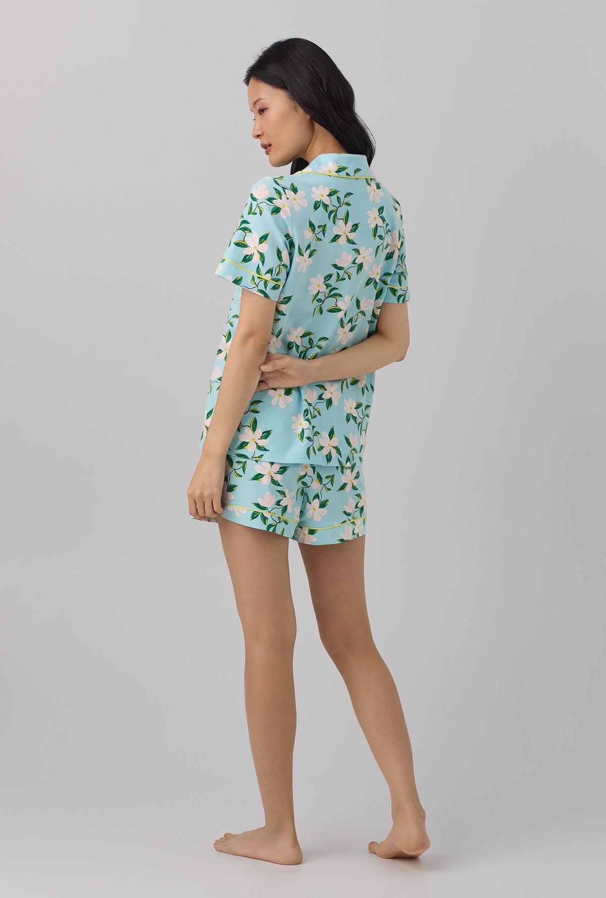 A lady wearing short sleeve classic shorty stretch jersey pj set with belle blossoms print