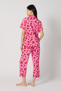 A lady wearing Watermelon Crush Short Sleeve Classic Stretch Jersey Cropped Pj Set back view