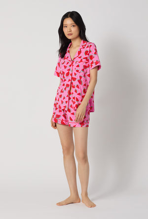 A lady wearing Watermelon Crush Short Sleeve Classic Shorty Stretch Jersey Pj Set looking front