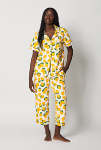 A lady one hand in pocket wearing White and Yellow Short Sleeve Classic Stretch Jersey Cropped Pj Set front view