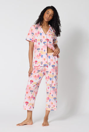 A Lady Wearing Serene Sunrise Short Sleeve Classic Stretch Jersey Cropped Pj Set