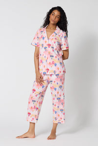 A Lady Wearing Serene Sunrise Short Sleeve Classic Stretch Jersey Cropped Pj Set in a side angled pose