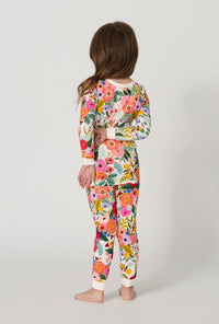 A Girl wearing Rifle Paper Co. x BedHead PJs Garden Party Long Sleeve Stretch Jersey Kids Pj Set back view
