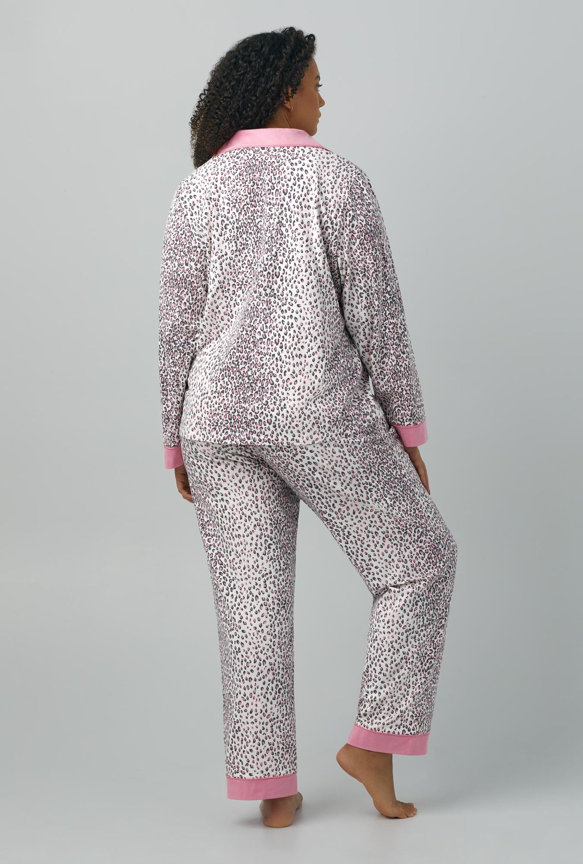 A lady wearing Long Sleeve Classic Stretch Jersey PJ Set with spa kitten print
