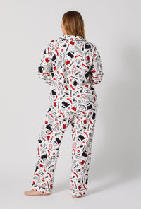 A lady wearing plus size Devil Wears Prada Long Sleeve Classic Stretch Jersey Pj Set back view
