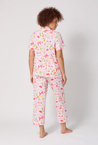 A lady wearing French Quarter Short Sleeve Classic Stretch Jersey Cropped Pj Set