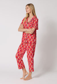 A Lady Wearing Monkeying Around Short Sleeve Classic Stretch Jersey Cropped Pj Set in a side angled pose