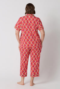 A Lady Wearing Plus Size Monkeying Around Short Sleeve Classic Stretch Jersey Cropped Pj Set in a back view pose