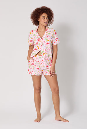 A lady wearing French Quarter Short Sleeve Classic Shorty Stretch Jersey Pj Set