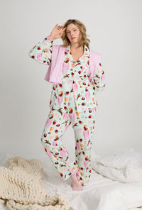 A lady one hand in back wearing Green Long Sleeve Classic Stretch Jersey plus size Pj Set front view