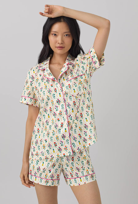 A lady wearing Short Sleeve Classic Shorty Woven Cotton Poplin PJ Set with darling floral print