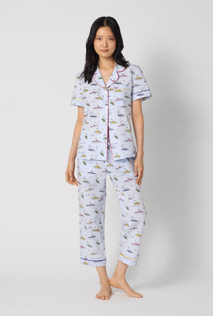 A lady wearing Catch A Wave Snoopy Short Sleeve Classic Woven Cotton Poplin Cropped Pj Set looking front