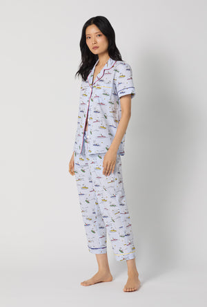 A lady wearing Catch A Wave Snoopy Short Sleeve Classic Woven Cotton Poplin Cropped Pj Set looking side