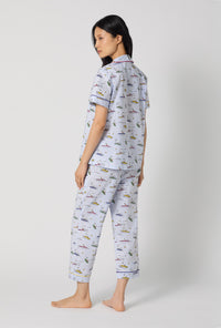 A lady wearing Catch A Wave Snoopy Short Sleeve Classic Woven Cotton Poplin Cropped Pj Set back view