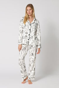 A Lady Wearing White Spooky In The City Long Sleeve Classic Stretch Jersey Pj Set