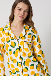 A lady wearing White and Yellow Long Sleeve Classic Stretch Jersey Pj Set side view