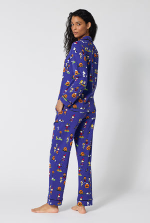 A Lady Wearing Spooky Season Snoopy Long Sleeve Classic Stretch Jersey Pj Set in a back view pose