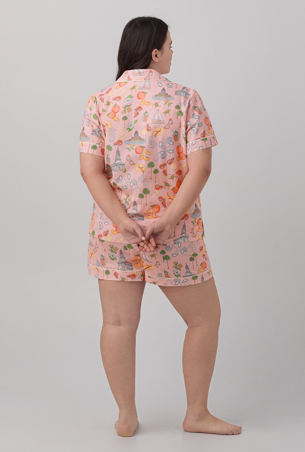 A lady wearing Short Sleeve Classic Shorty Woven Cotton Poplin PJ Set with charming charleston print