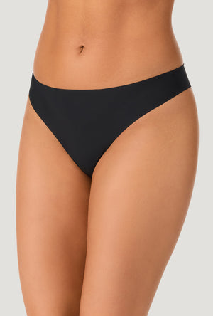 A lady wearing Black Free Cut Micro Thong Underwear