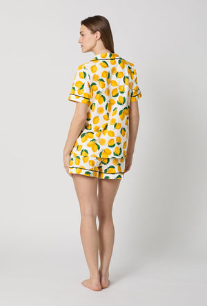 A lady wearing White and Yellow Short Sleeve Classic Shorty Stretch Jersey Pj Set back view