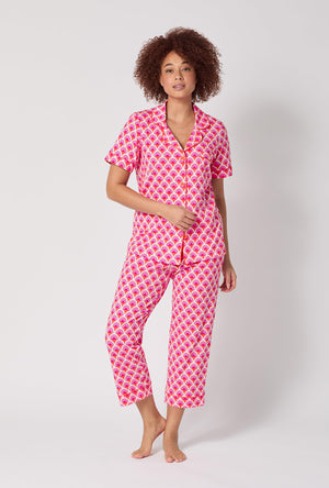 A lady wearing BedHead x Trina Turk Scallop Short Sleeve Classic Stretch Jersey Cropped Pj Set