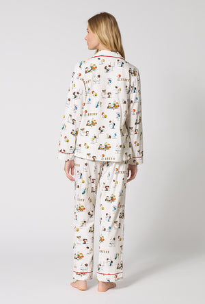 A Lady Wearing Snoopy's Game Day Long Sleeve Classic Stretch Jersey Pj Set in a back view pose
