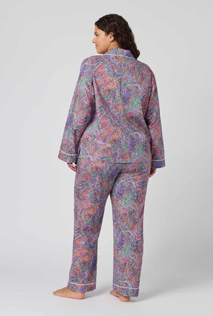 A Lady Wearing Plus Size Dana Sharmin Long Sleeve Classic Woven Tana Lawn® Pj Set Made With Liberty Fabrics in a back view pose