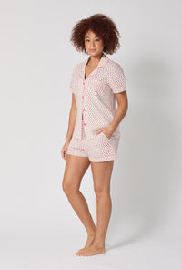 A lady wearing Blossom Geo Short Sleeve Classic Shorty Stretch Jersey Pj Set