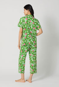 A Lady Wearing Monstera Bloom Short Sleeve Classic Stretch Jersey Cropped Pj Set showing the back view