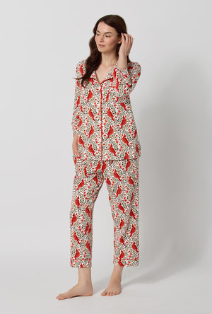 A lady wearing Rifle Paper Co. x BedHead PJs Cardinals 3/4 Sleeve Classic Stretch Jersey Cropped Pj Set looking side