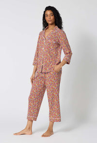 A lady wearing Ditsy Harvest 3/4 Sleeve Classic Stretch Jersey Cropped Pj Set looking front