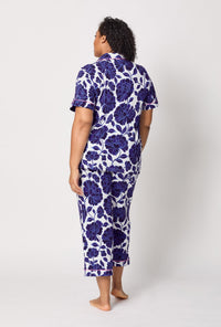 A lady wearing plus size Blue and White Short Sleeve Classic Stretch Jersey Cropped Pj Set back view