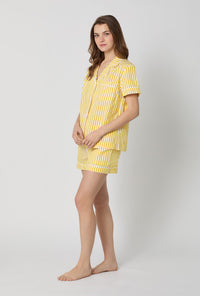 A lady wearing Yellow Short Sleeve Classic Shorty Woven Cotton Sateen Pj Set side view