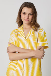 A closeup of A lady wearing Yellow Short Sleeve Classic Shorty Woven Cotton Sateen Pj Set