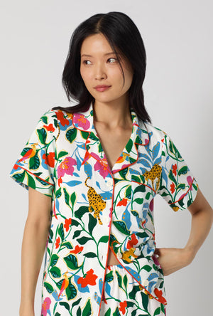 A Lady Wearing Jungle Serenade Short Sleeve Classic Stretch Jersey Cropped Pj Set posing in a half zoomed close up shot