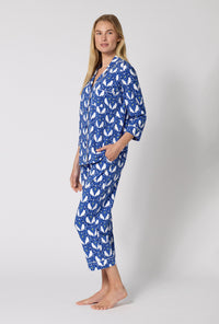 A lady wearing Owl Be Back 3/4 Sleeve Classic Stretch Jersey Cropped Pj Set side view