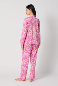 A Lady Wearing Luxe Leopard Long Sleeve Classic Stretch Jersey Pj Set turned back while looking to the side