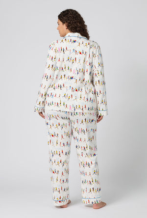A lady wearing plus size Run NYC Run Long Sleeve Classic Stretch Jersey Pj Set back view