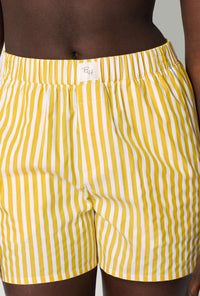 A closeup of A lady wearing Yellow Cotton Sateen Boxer Short